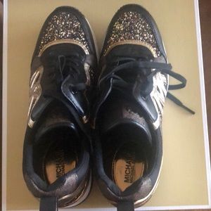 Beautiful MK shoes that can be dressed up or down. Worn once.